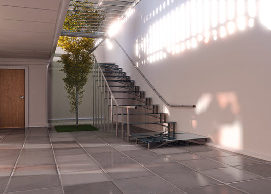 Stylish basement flooring Colorado Springs families choose, featuring glossy tiles, glass stairs, and natural indoor greenery.