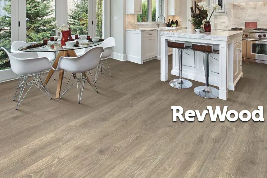 RevWood flooring installation in an open kitchen and dining area, featuring realistic wood look and everyday durability