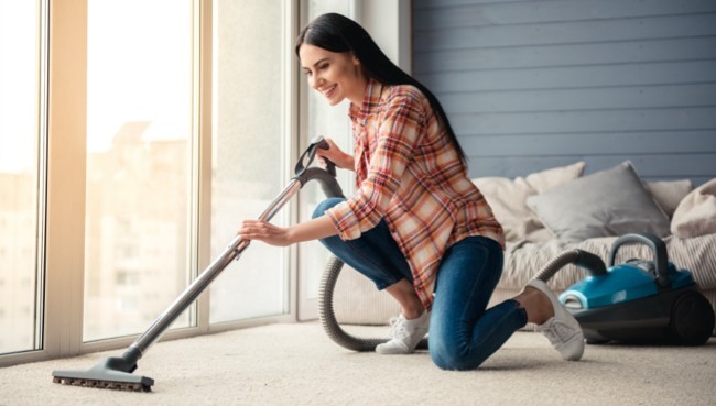 Lady cleaning carpet floor | Floor Craft